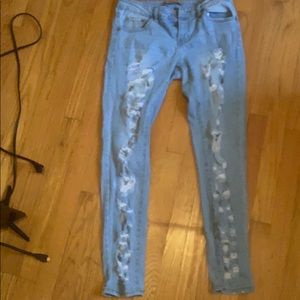 Woman’s ripped jeans